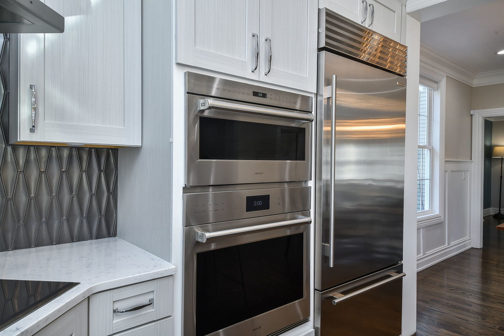 325 North Wright Street Naperville, IL 60540 - Photo 14 of 53 a kitchen with cabinets and stainless steel appliances