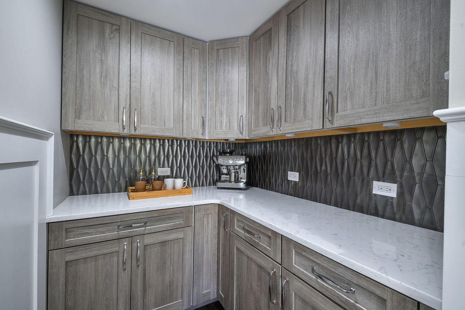 325 North Wright Street Naperville, IL 60540 - Photo 16 of 53 a kitchen with a sink and cabinets