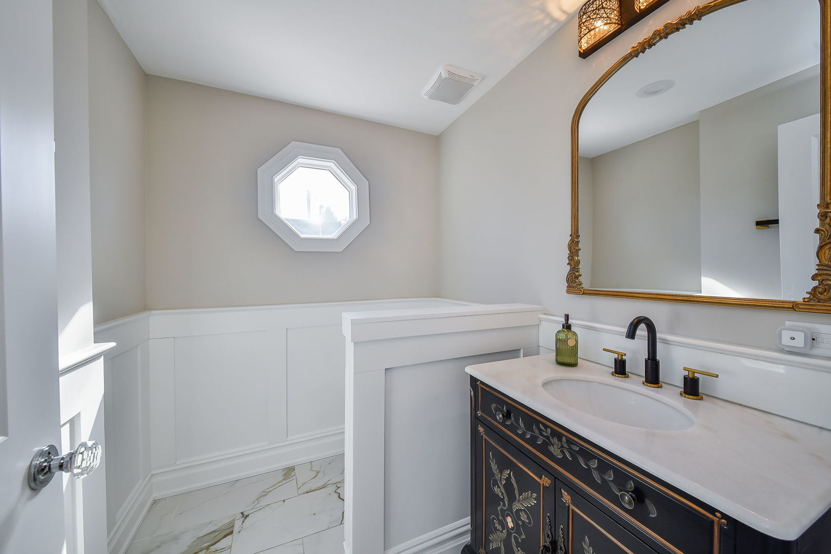 325 North Wright Street Naperville, IL 60540 - Photo 17 of 53 a bathroom with a sink a vanity and a mirror