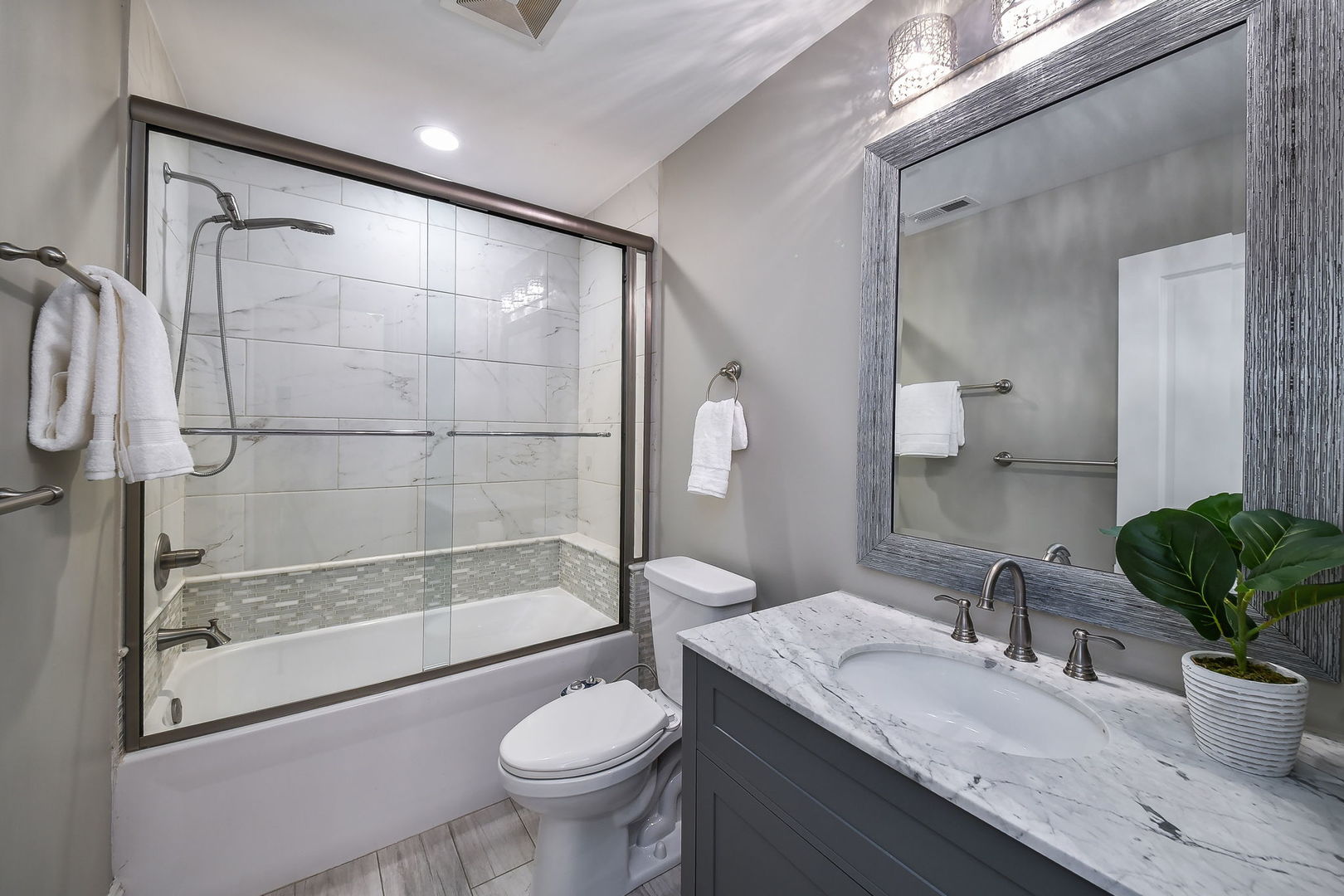325 North Wright Street Naperville, IL 60540 - Photo 26 of 53 a bathroom with a granite countertop sink toilet and shower