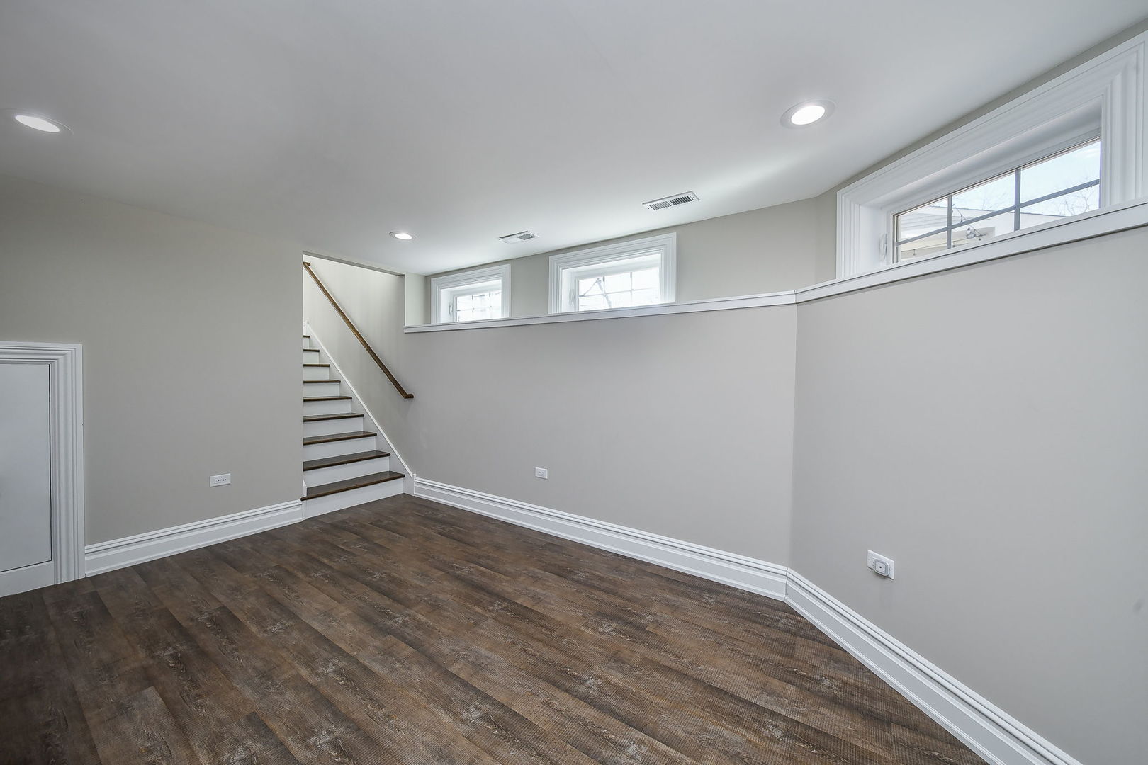 325 North Wright Street Naperville, IL 60540 - Photo 31 of 53 a view of an empty room with wooden floor