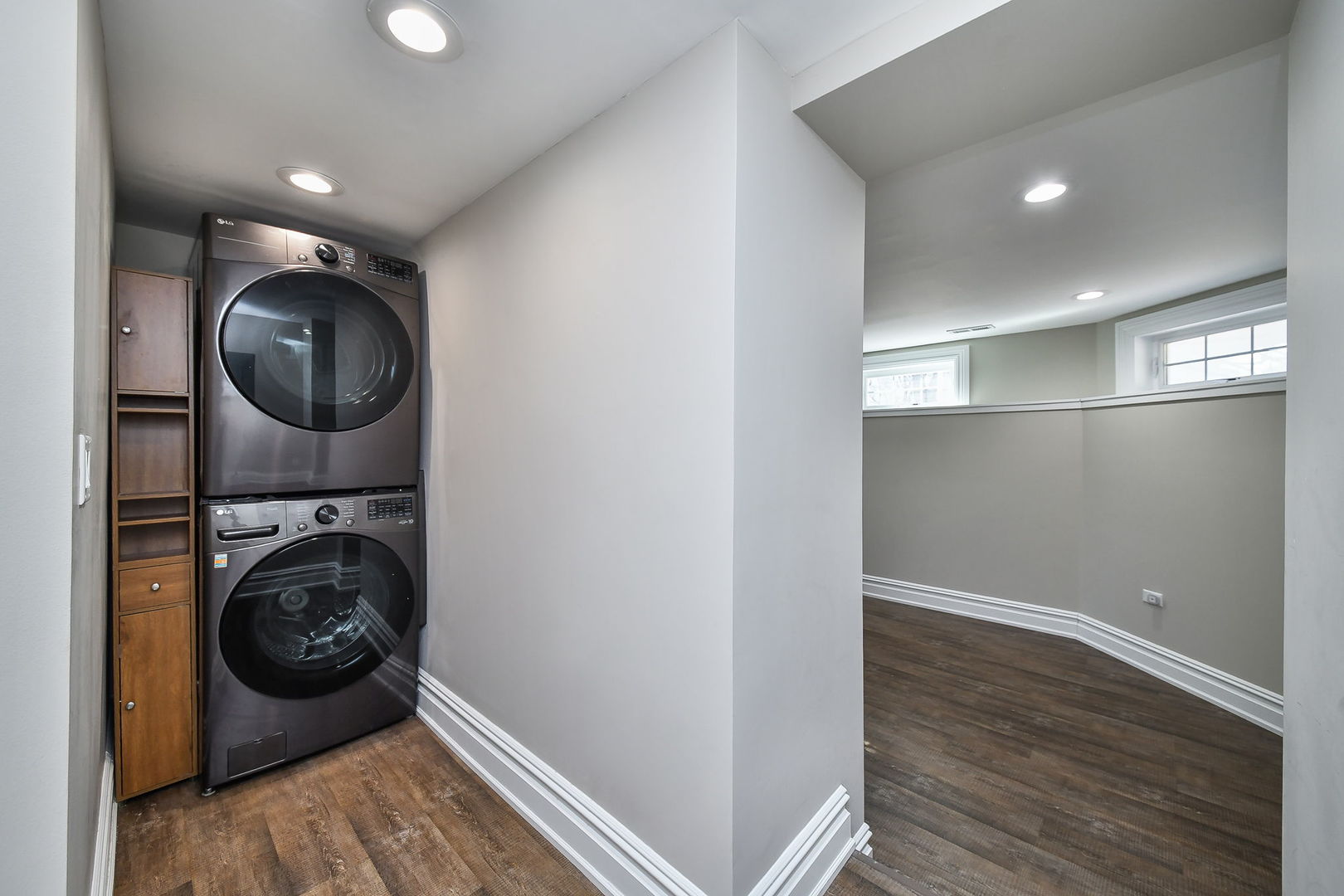 325 North Wright Street Naperville, IL 60540 - Photo 35 of 53 a view of a hallway with washer and dryer