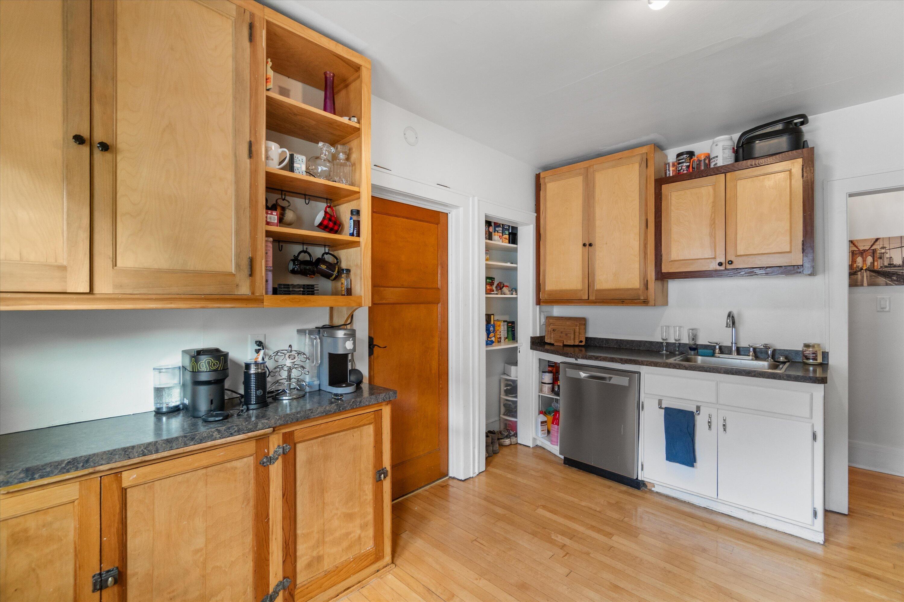 159 North 59th Street Milwaukee, WI 53213 - Photo 23 of 34 Bright kitchen with abundant cabinet space and sleek countertops