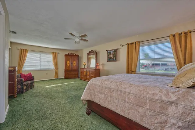a bathroom with a sink vanity and a mirror