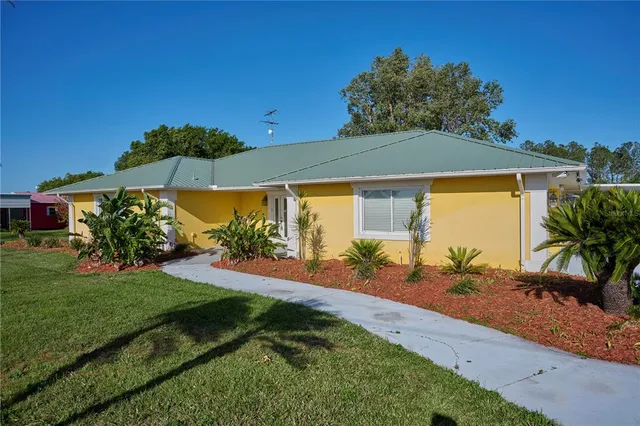 a house view with a lake view