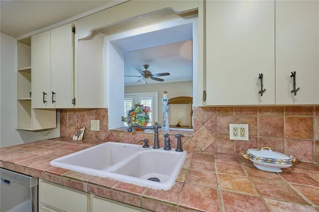 a view of living room and kitchen