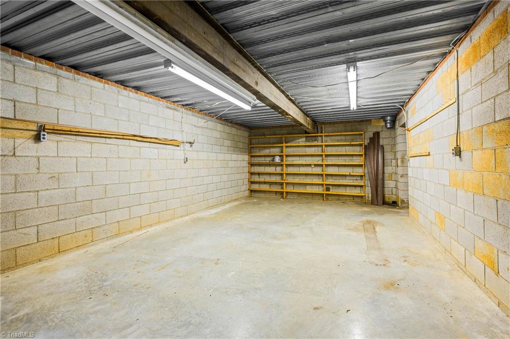4200 Clinard Road Clemmons, NC 27012 - Photo 44 of 49 Basement workshop and storage