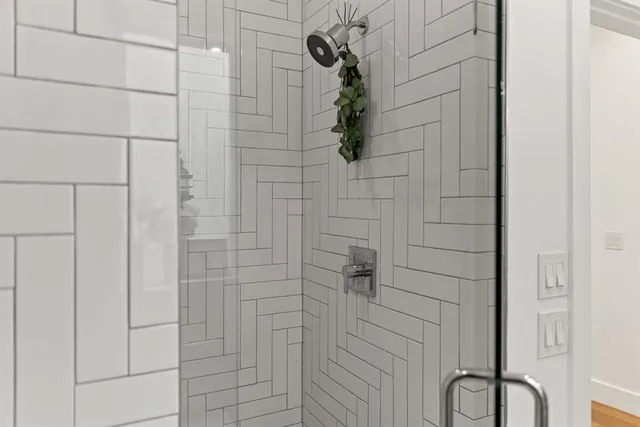 a bed room with a bed and a television