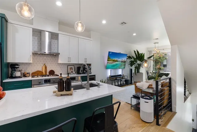 a kitchen with a sink and cabinets