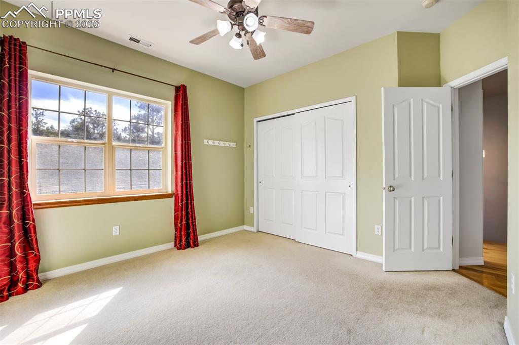 18554 Wetherill Road Monument, CO 80132 - Photo 32 of 50 a view of an empty room with a window
