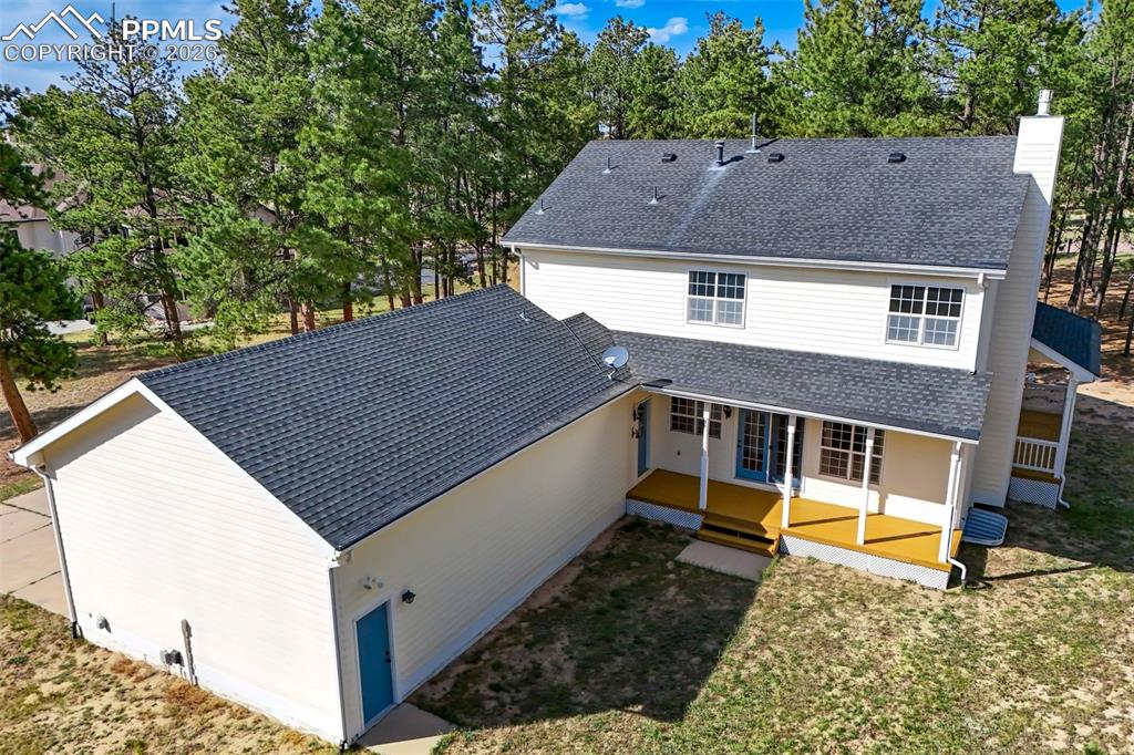 18554 Wetherill Road Monument, CO 80132 - Photo 46 of 50 a aerial view of a house with a yard