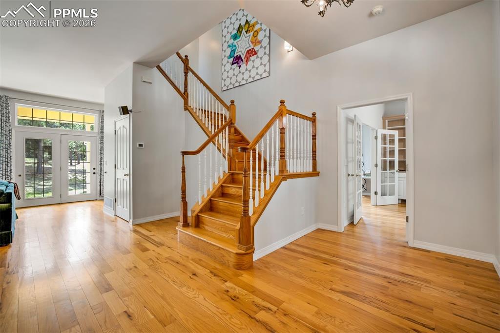 18554 Wetherill Road Monument, CO 80132 - Photo 5 of 50 a view of entryway and hall with wooden floor