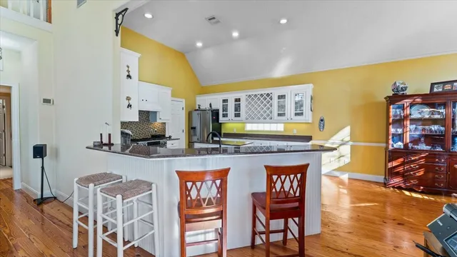 a bathroom with a sink double vanity and a mirror