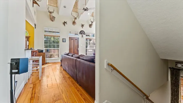 an aerial view of a house with a lake view