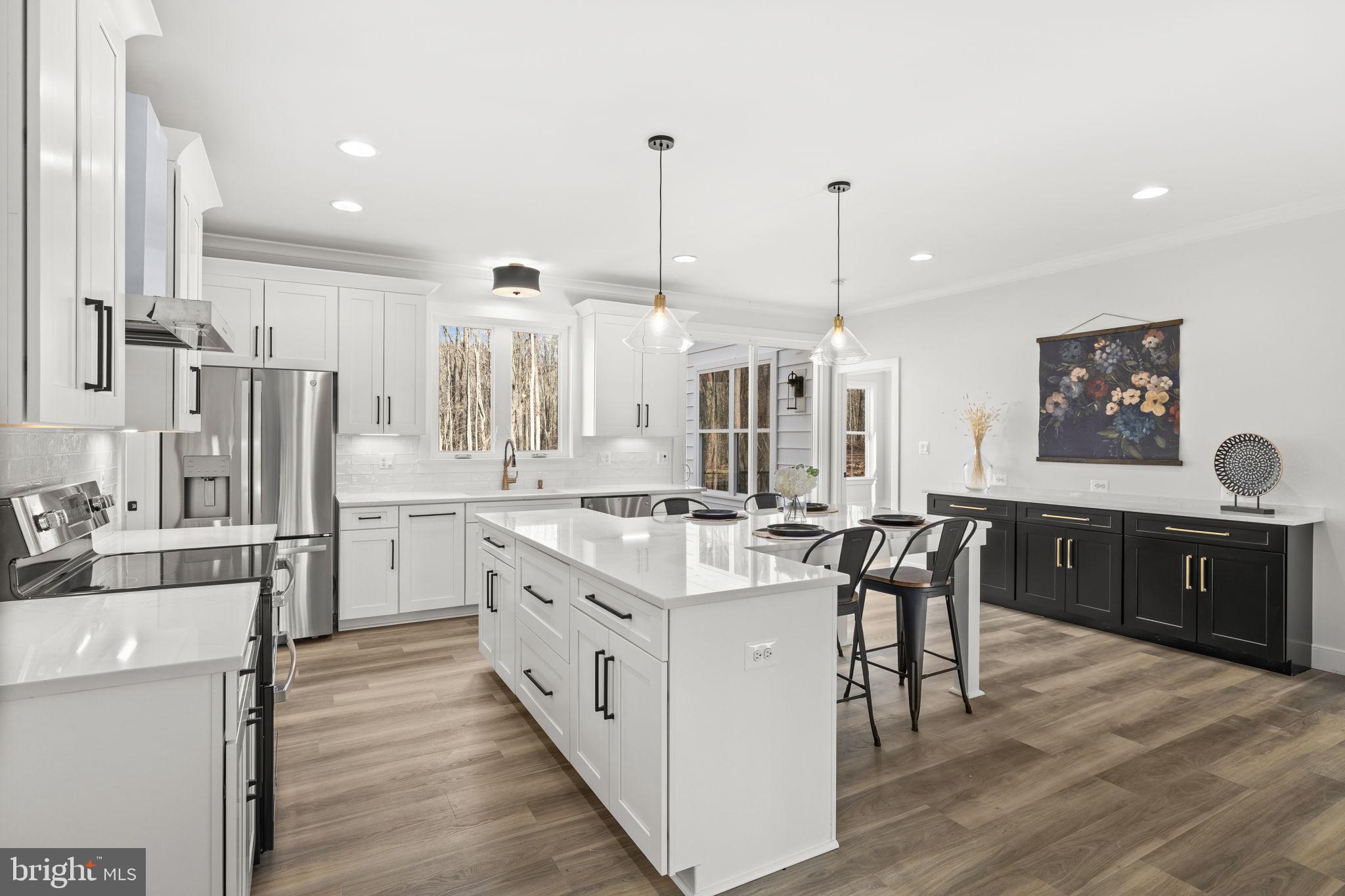 20373 Beaver Crk Court Lignum, VA 22726 - Photo 11 of 61 a large white kitchen with lots of counter space and appliances