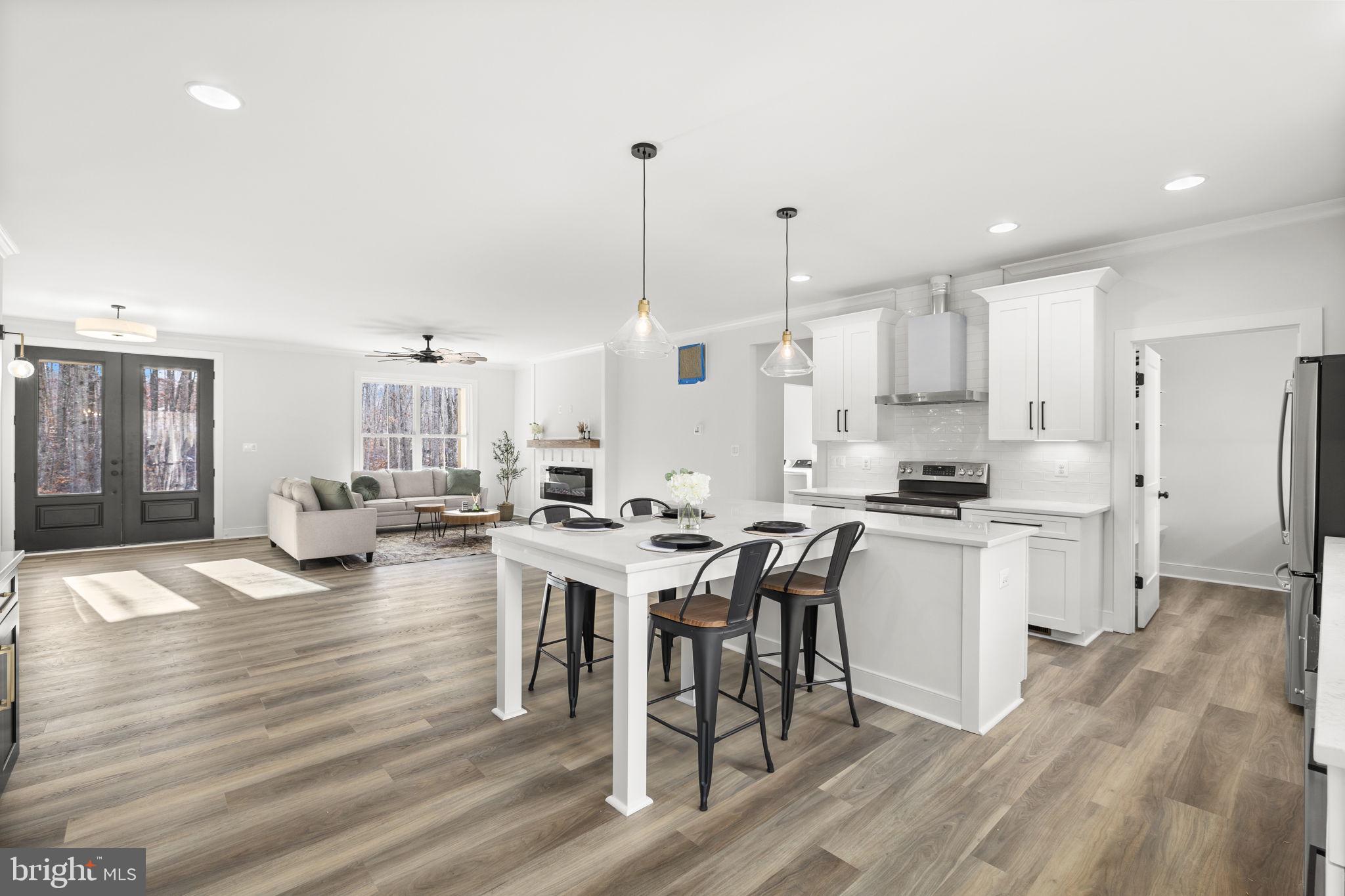 20373 Beaver Crk Court Lignum, VA 22726 - Photo 15 of 61 a open kitchen with white cabinets and stainless steel appliances