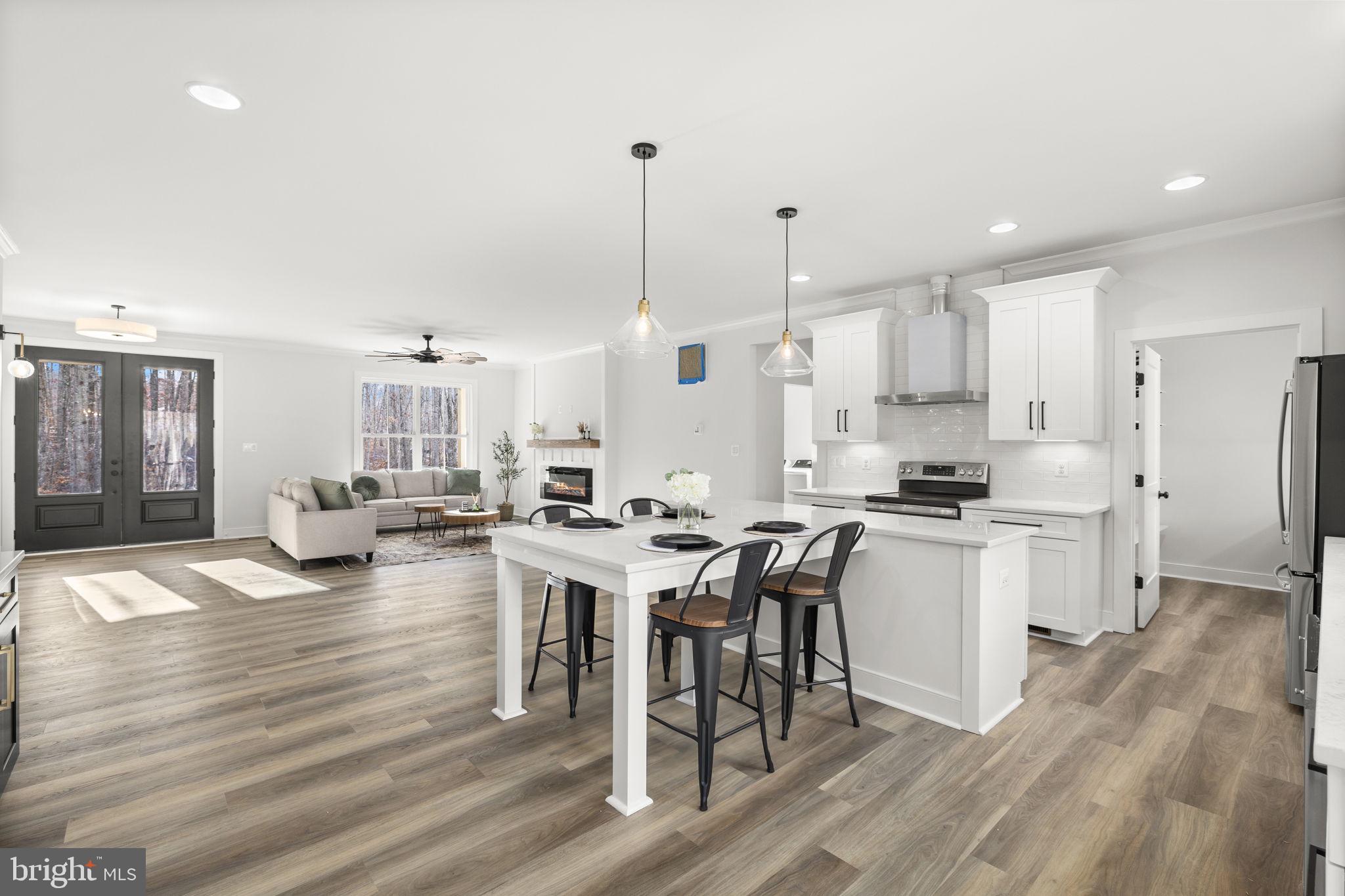 20373 Beaver Crk Court Lignum, VA 22726 - Photo 16 of 61 a open kitchen with white cabinets and stainless steel appliances