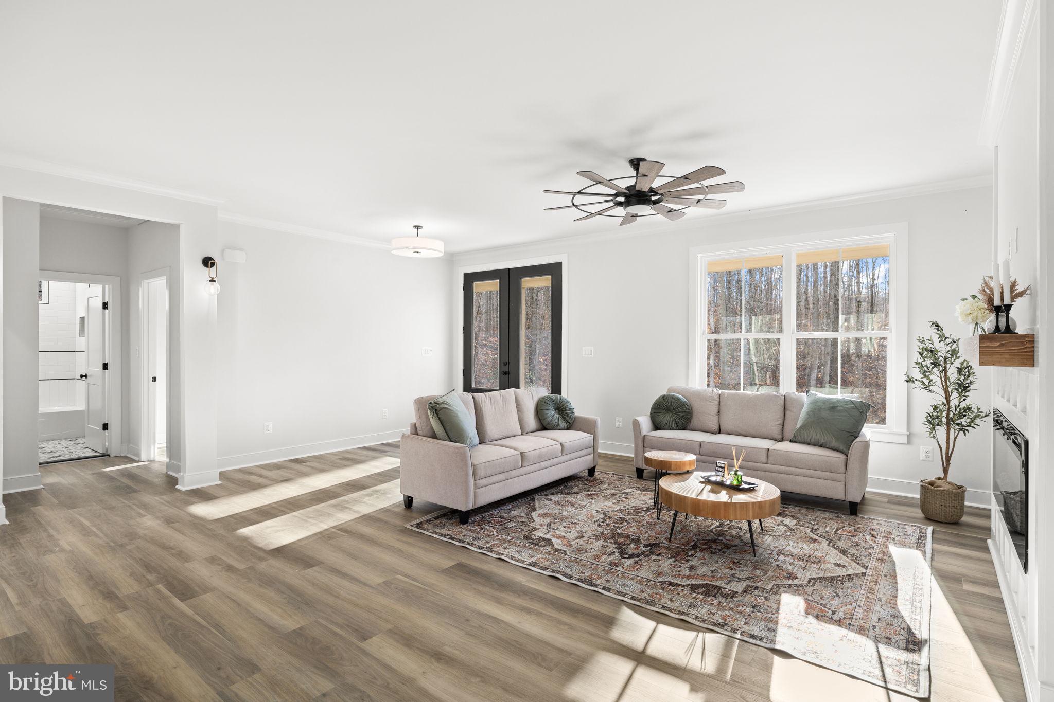20373 Beaver Crk Court Lignum, VA 22726 - Photo 17 of 61 a living room with furniture and a large window