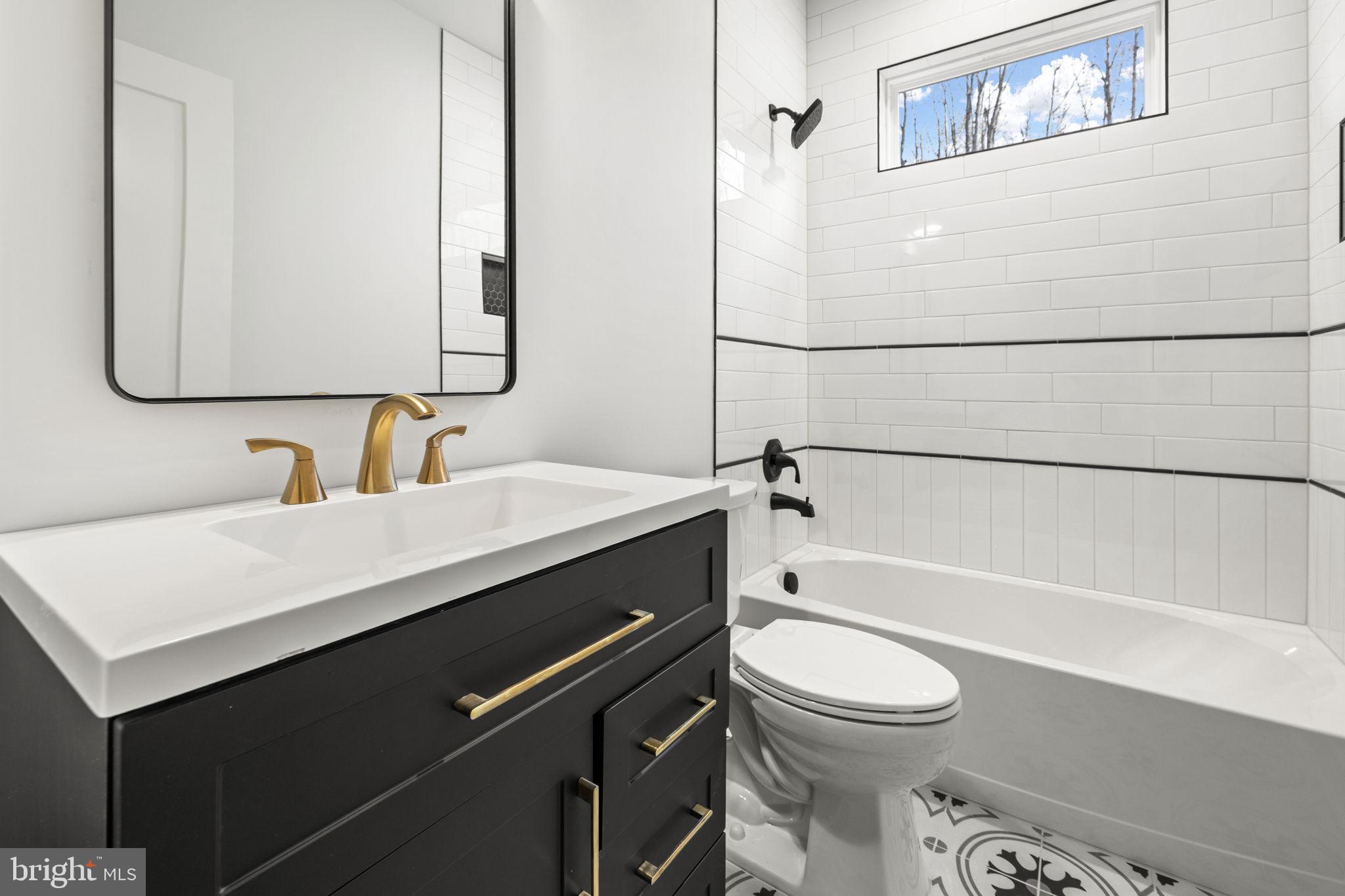 20373 Beaver Crk Court Lignum, VA 22726 - Photo 18 of 61 a bathroom with a sink a toilet and a bathtub