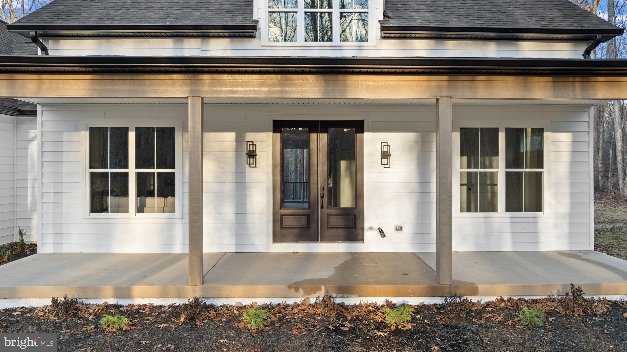20373 Beaver Crk Court Lignum, VA 22726 - Photo 2 of 61 a view of a building with entrance door