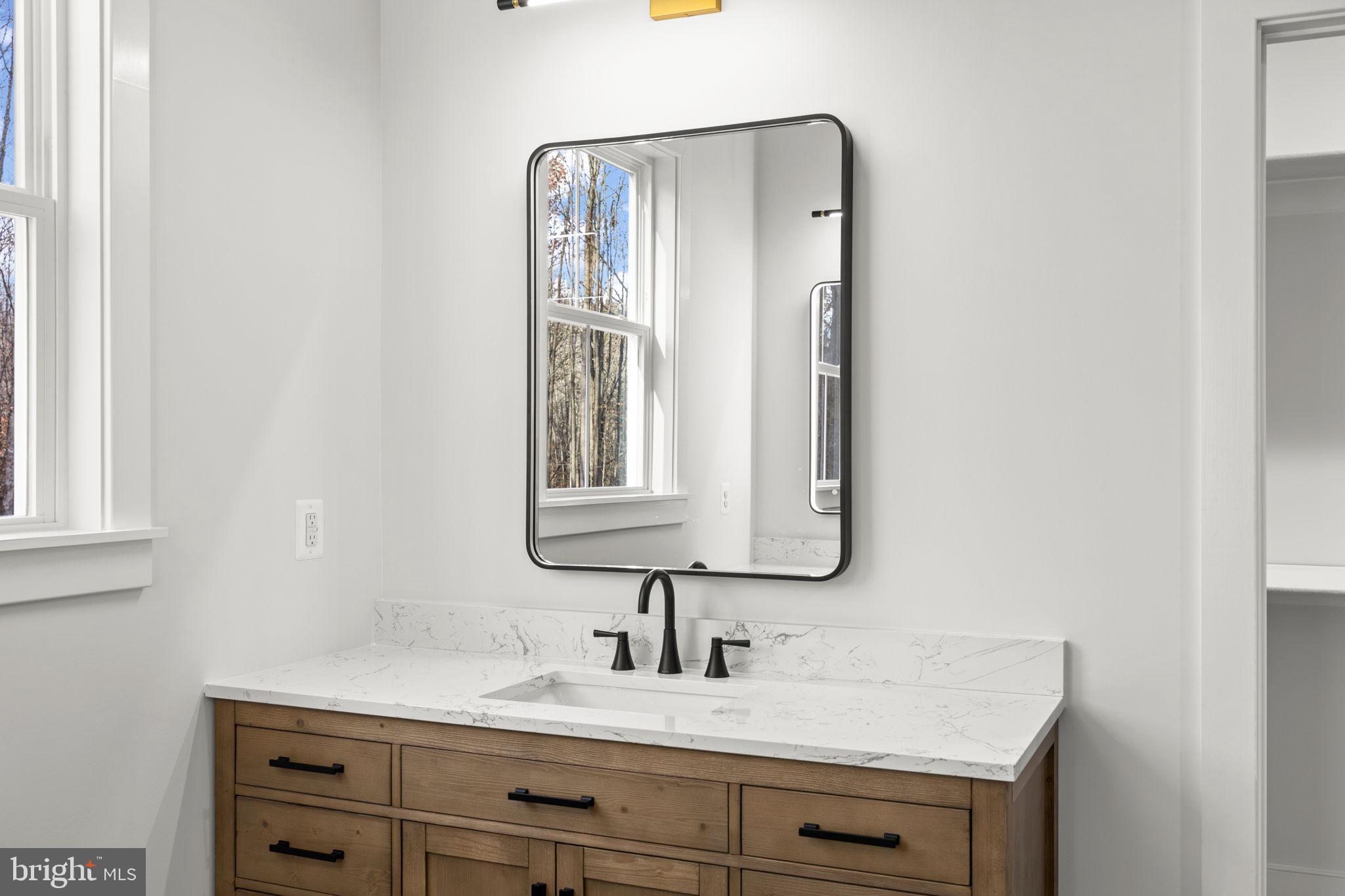 20373 Beaver Crk Court Lignum, VA 22726 - Photo 25 of 61 a bathroom with a sink and a mirror