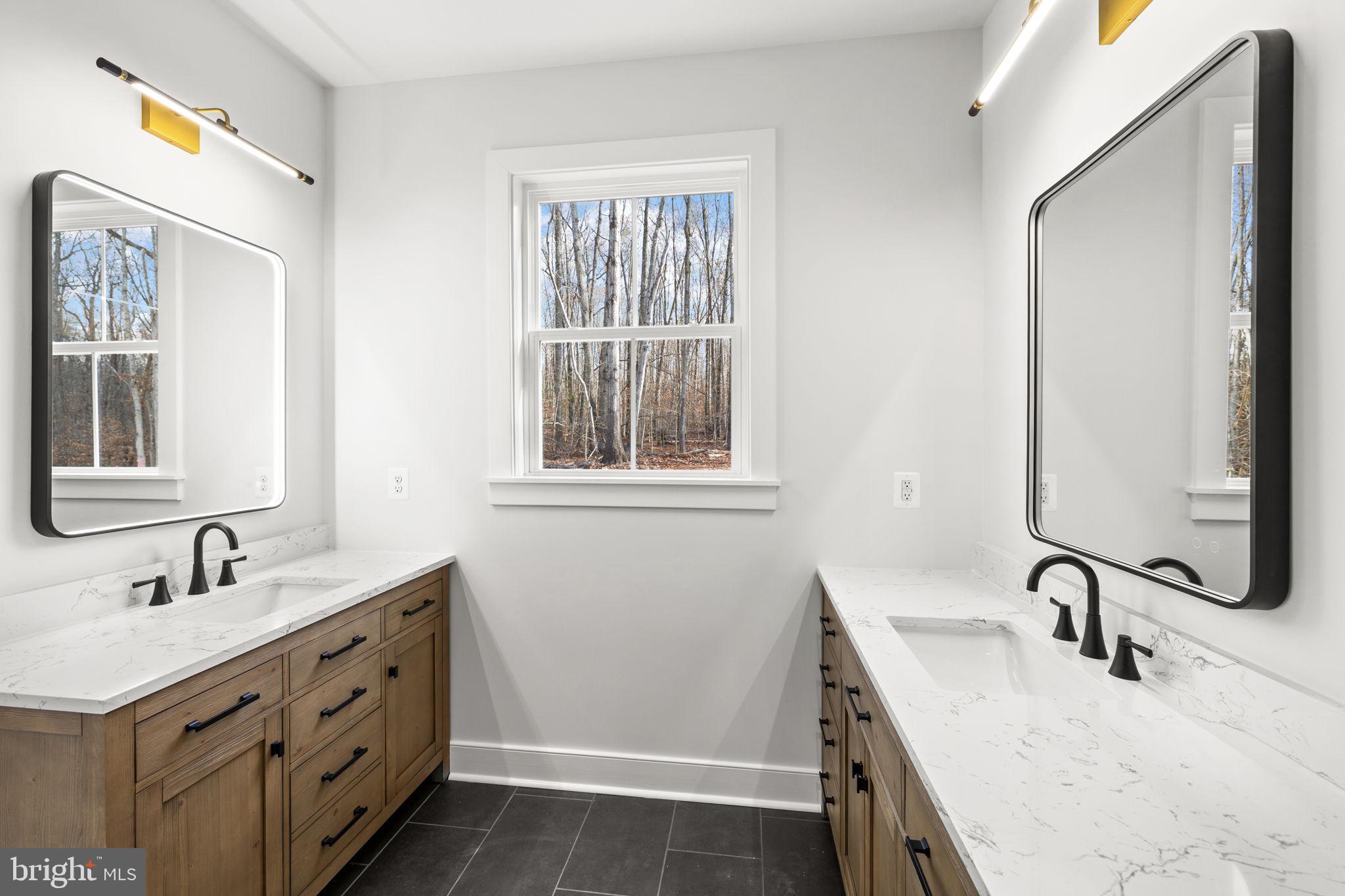 20373 Beaver Crk Court Lignum, VA 22726 - Photo 26 of 61 a bathroom with a sink double vanity and a mirror