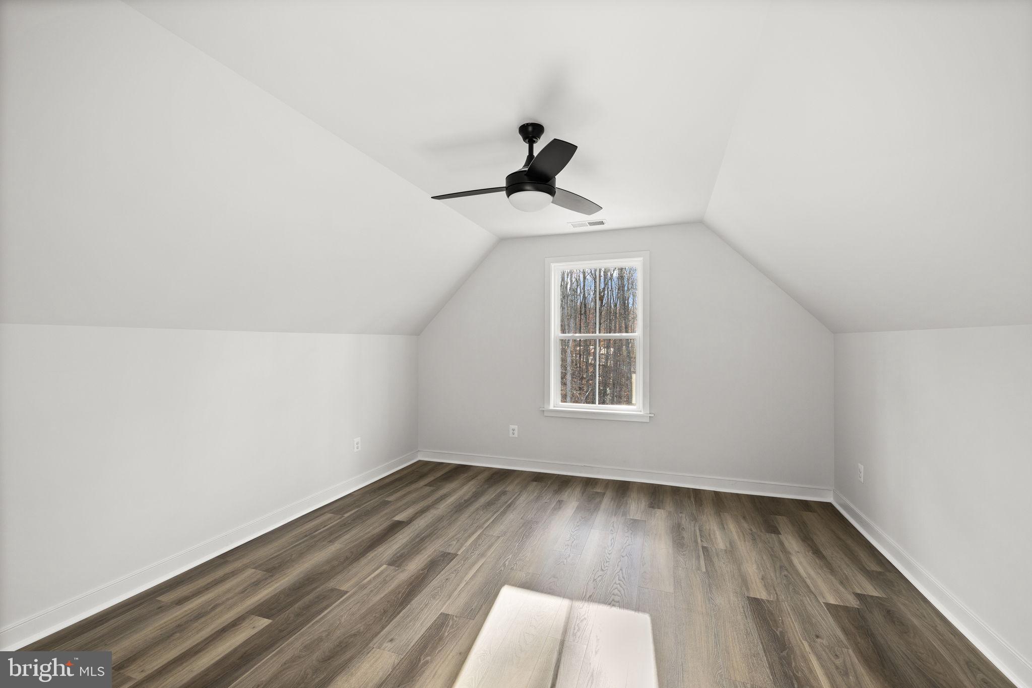 20373 Beaver Crk Court Lignum, VA 22726 - Photo 35 of 61 a view of a room with wooden floor and windows