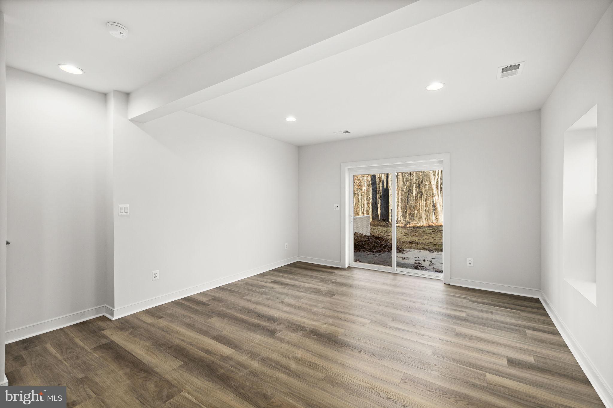 20373 Beaver Crk Court Lignum, VA 22726 - Photo 37 of 61 a view of an empty room with wooden floor