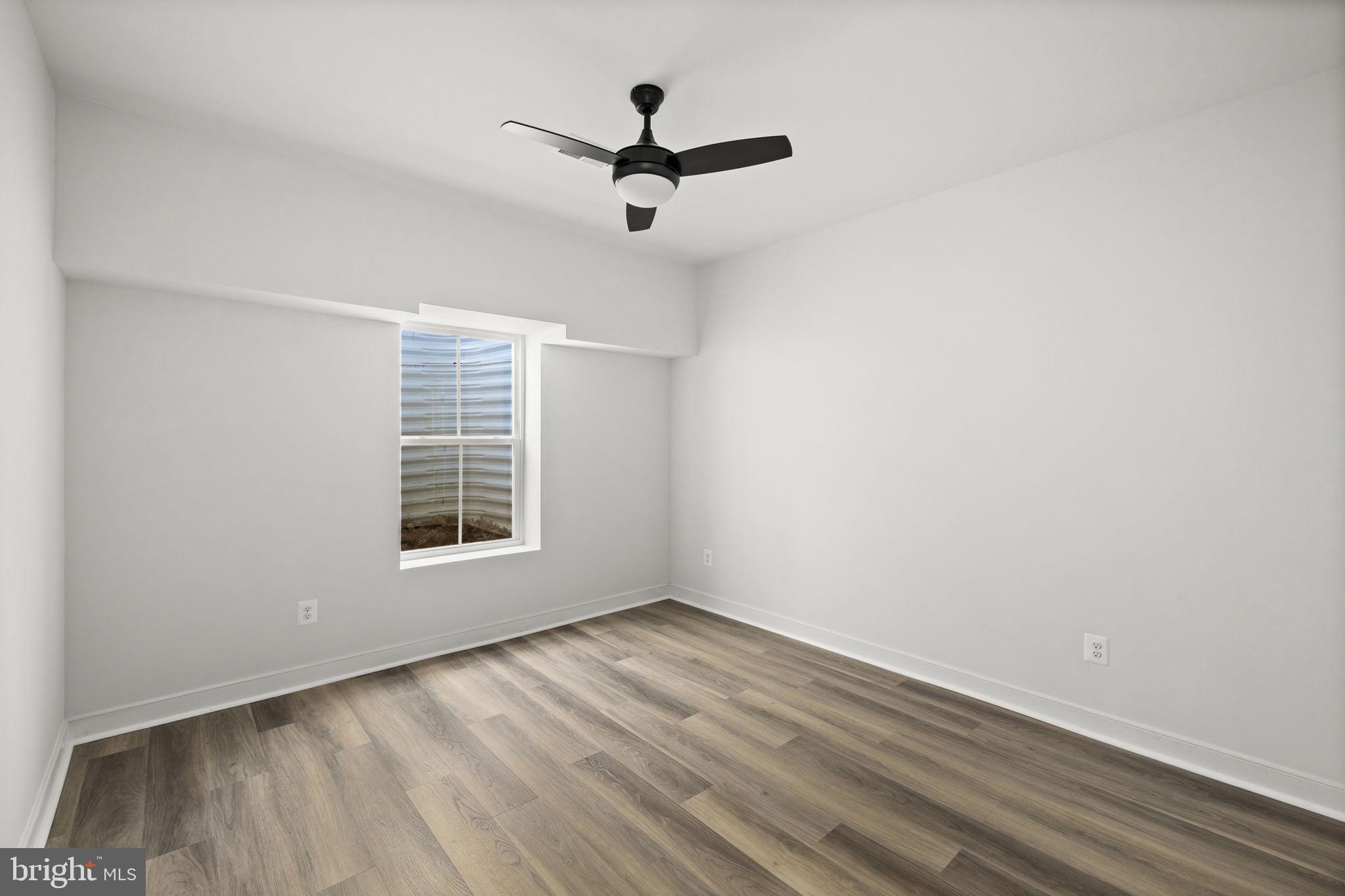 20373 Beaver Crk Court Lignum, VA 22726 - Photo 39 of 61 wooden floor in an empty room with a window