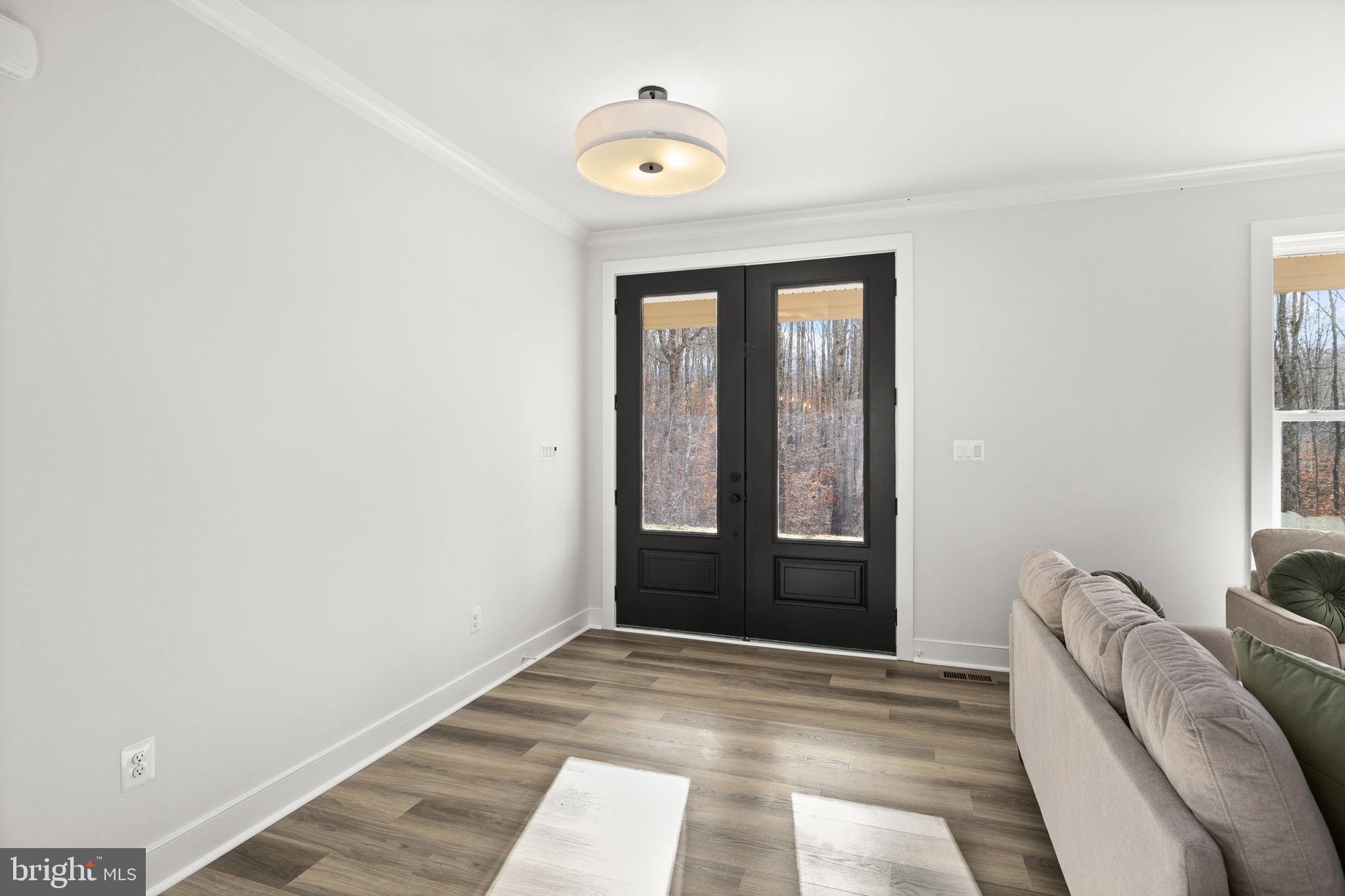 20373 Beaver Crk Court Lignum, VA 22726 - Photo 4 of 61 a view of a bedroom with a bed and a window