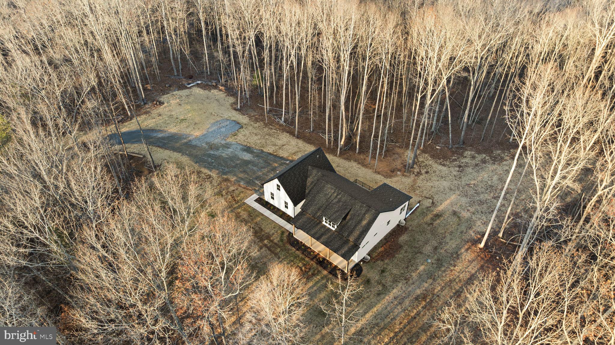 20373 Beaver Crk Court Lignum, VA 22726 - Photo 45 of 61 a view of a bench in a yard