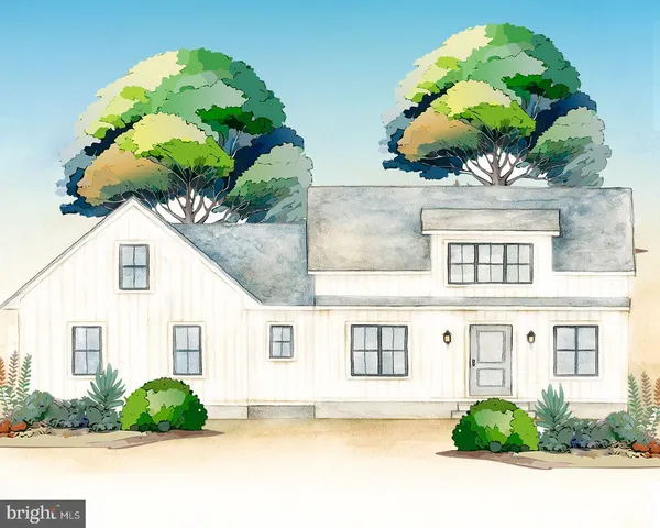 a front view of a house with a yard and outdoor seating