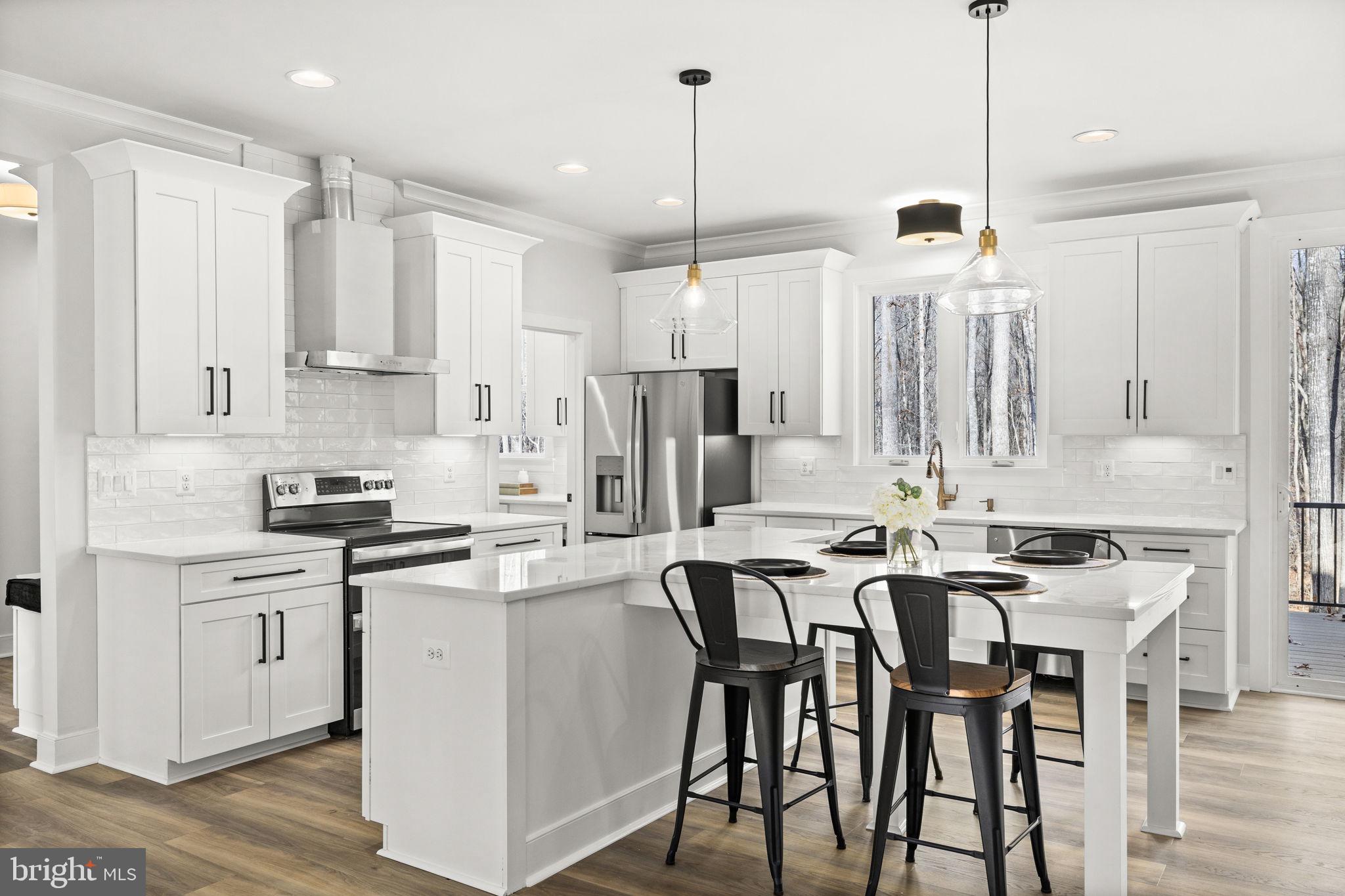 20373 Beaver Crk Court Lignum, VA 22726 - Photo 10 of 61 a kitchen that has a lot of cabinets a sink and appliances in it