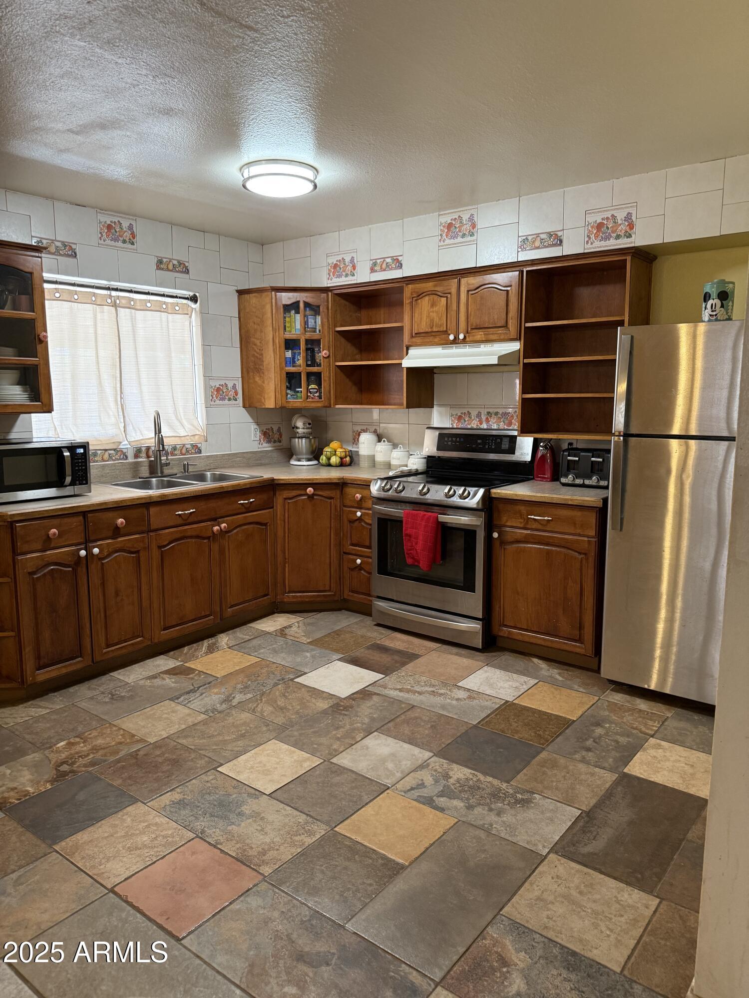 1627 West Carson Road Phoenix, AZ 85041 - Photo 14 of 25 IMG_6665