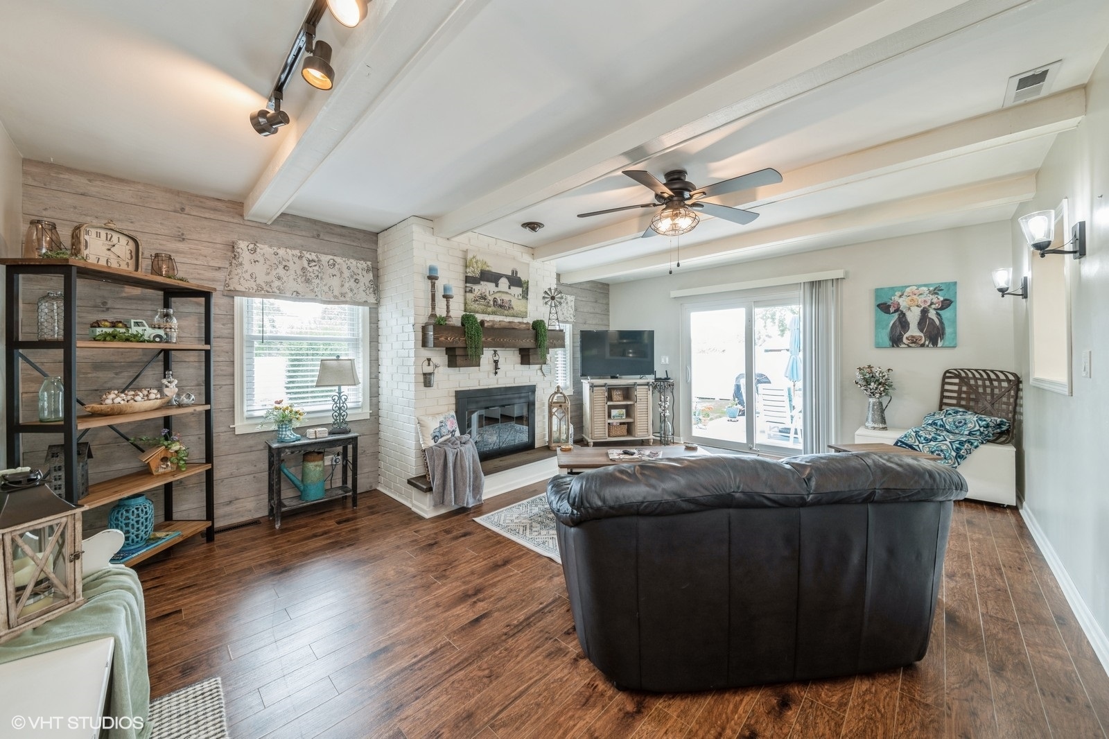 339 Yarmouth Road Elk Grove Village, IL 60007 - Photo 16 of 40 a living room with fireplace furniture and a wooden floor
