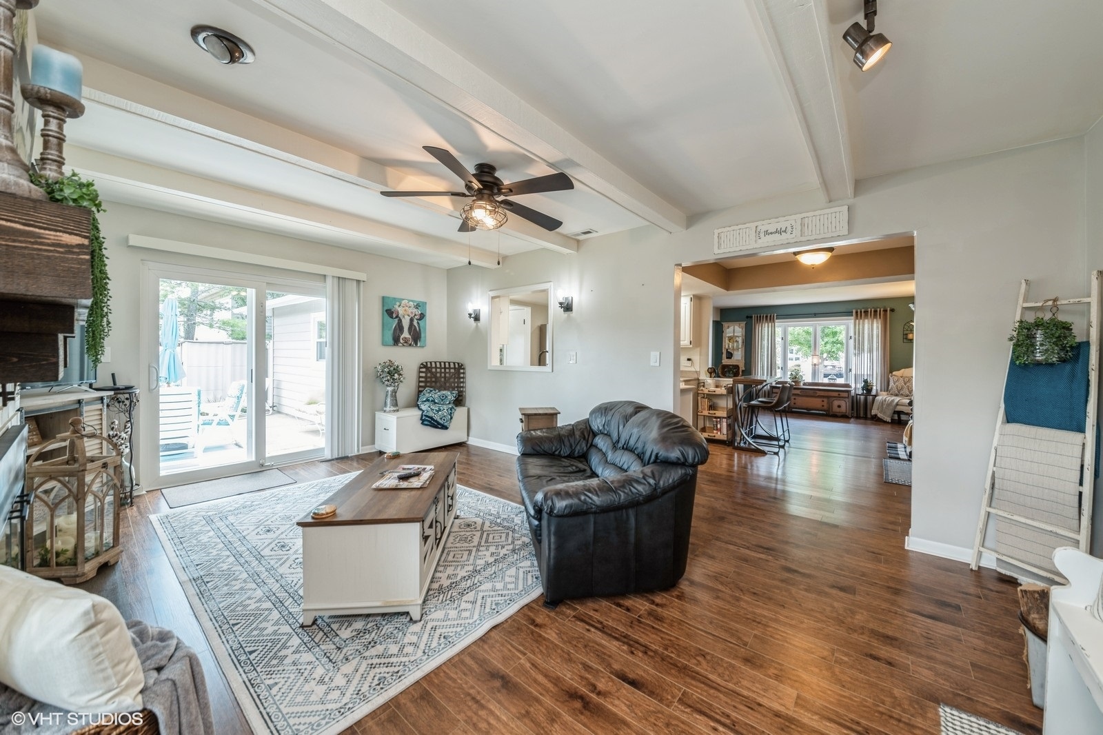 339 Yarmouth Road Elk Grove Village, IL 60007 - Photo 17 of 40 a living room with furniture and a large window