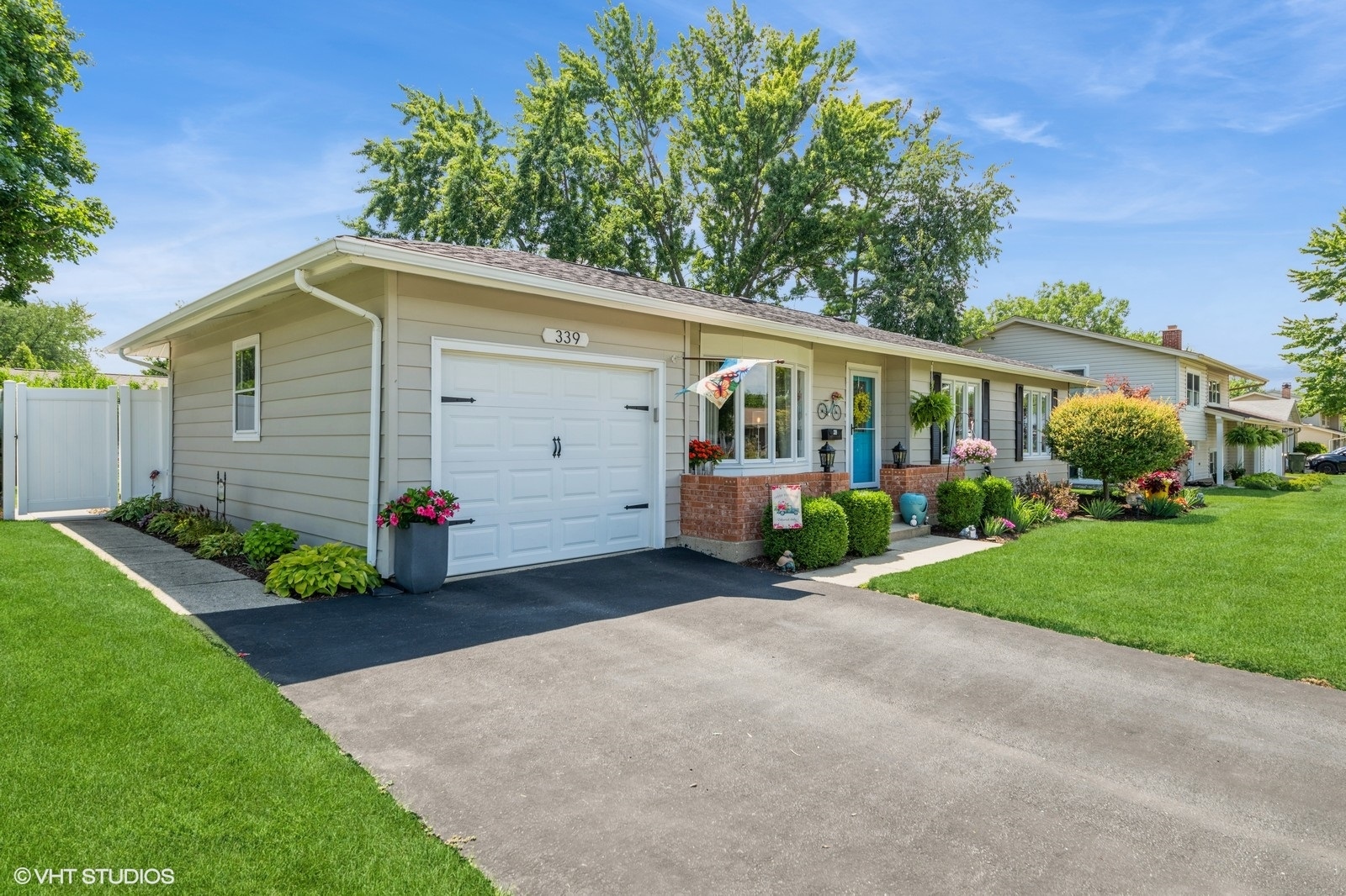 339 Yarmouth Road Elk Grove Village, IL 60007 - Photo 19 of 40 a view of a house with a backyard