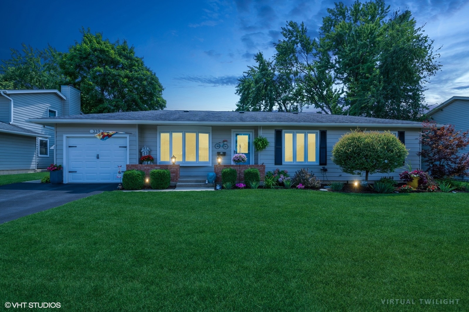 339 Yarmouth Road Elk Grove Village, IL 60007 - Photo 2 of 40 a front view of house with yard and green space