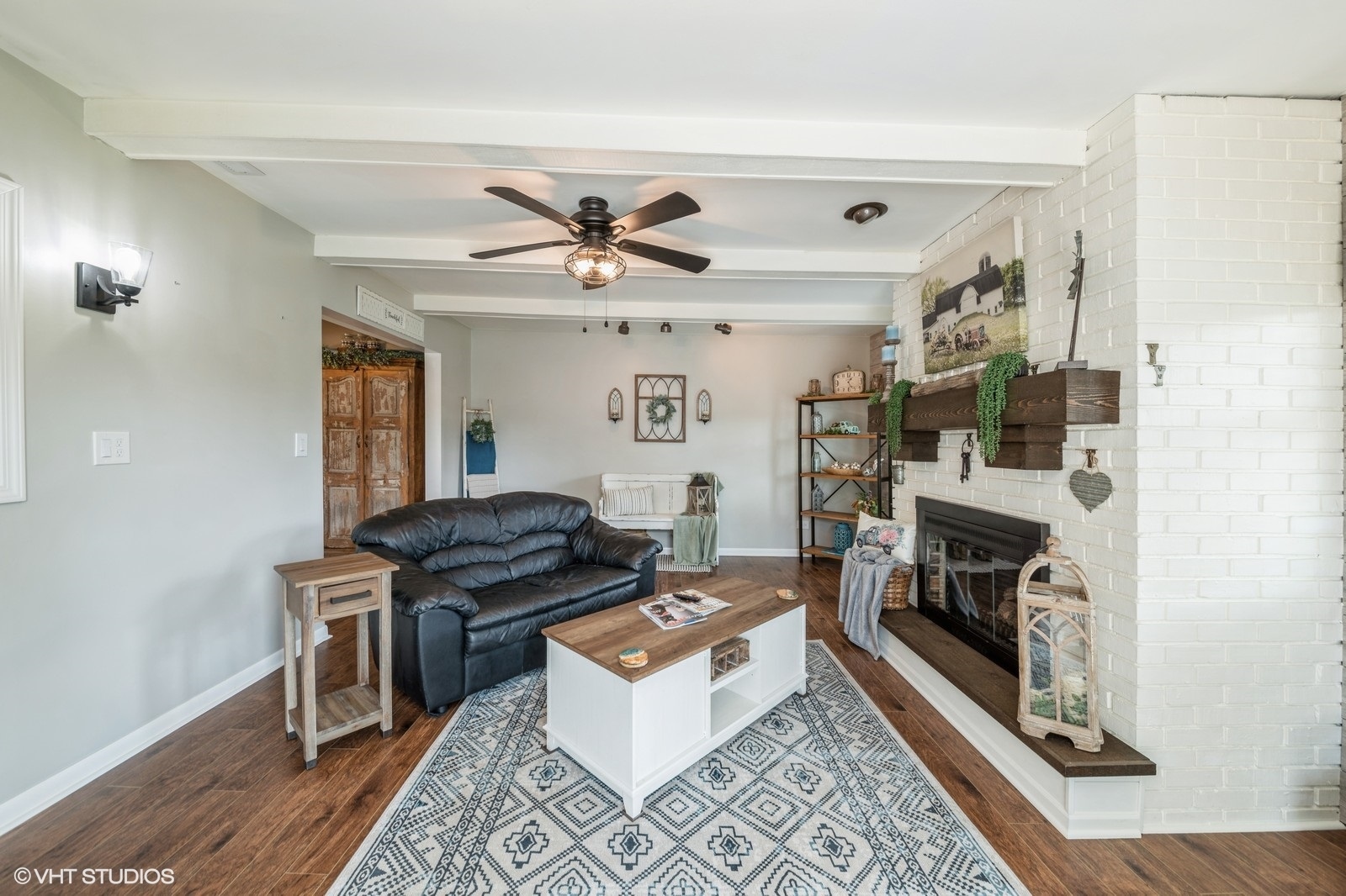 339 Yarmouth Road Elk Grove Village, IL 60007 - Photo 21 of 40 a living room with furniture and a fireplace