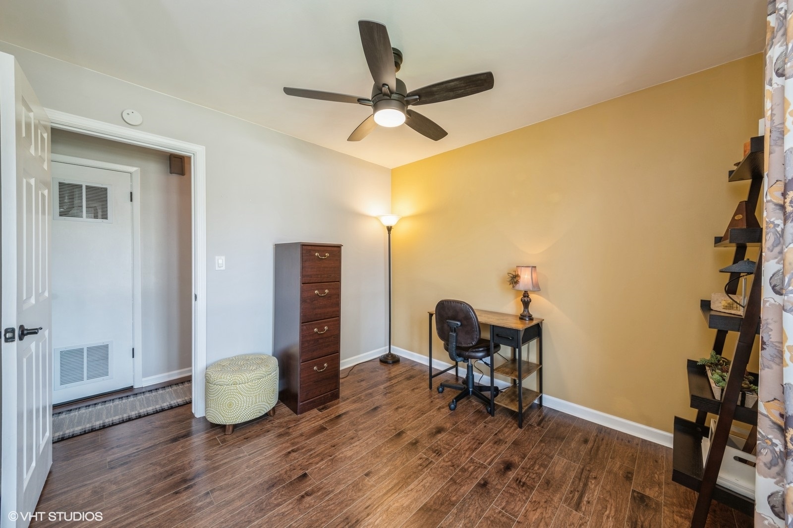 339 Yarmouth Road Elk Grove Village, IL 60007 - Photo 27 of 40 a view of a workspace with furniture and wooden floor
