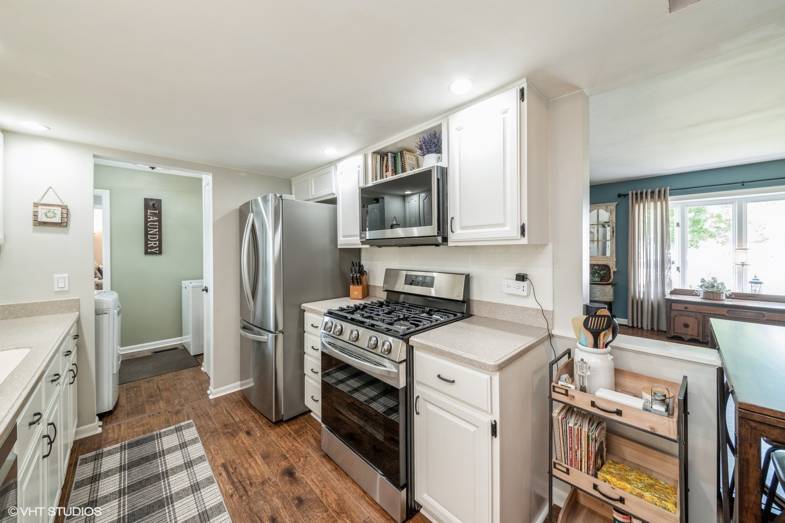 339 Yarmouth Road Elk Grove Village, IL 60007 - Photo 9 of 40 a kitchen with a stove sink and refrigerator