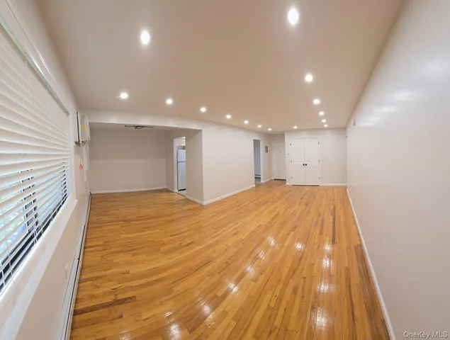 a view of hallway with a window