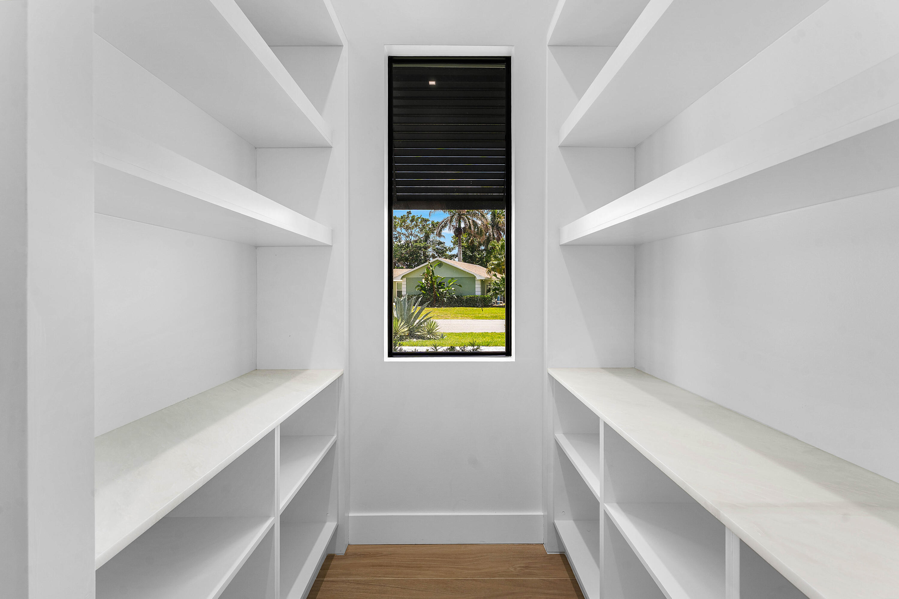 5701 Old Orange Road Jupiter, FL 33458 - Photo 8 of 46 a bathroom with a window and a bathtub