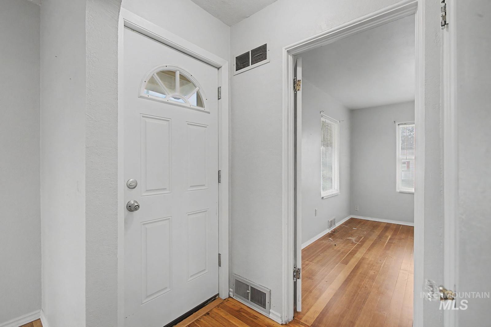 918 Elm Street Clarkston, WA 99403 - Photo 3 of 35 Foyer entrance with light wood-style flooring and baseboards