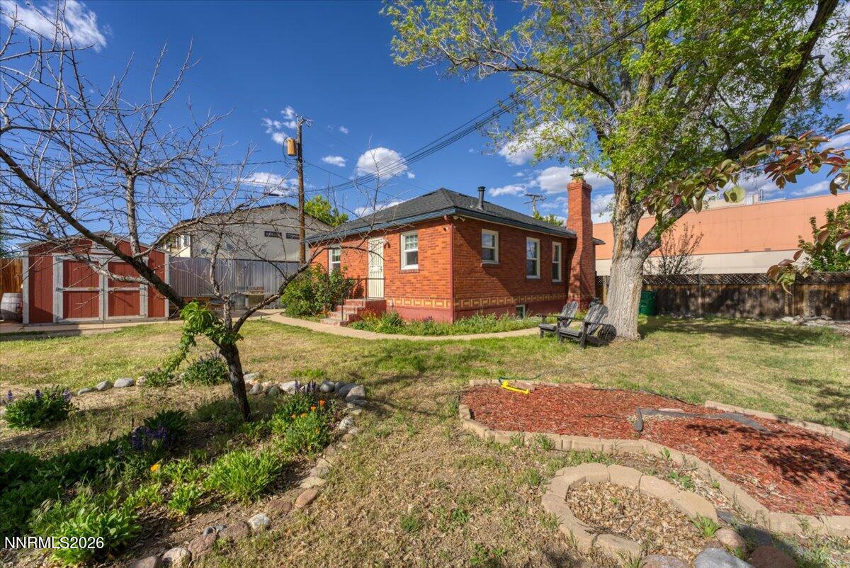 1025 Locust Street Reno, NV 89502 - Photo 19 of 28 a view of a backyard with a garden and plants