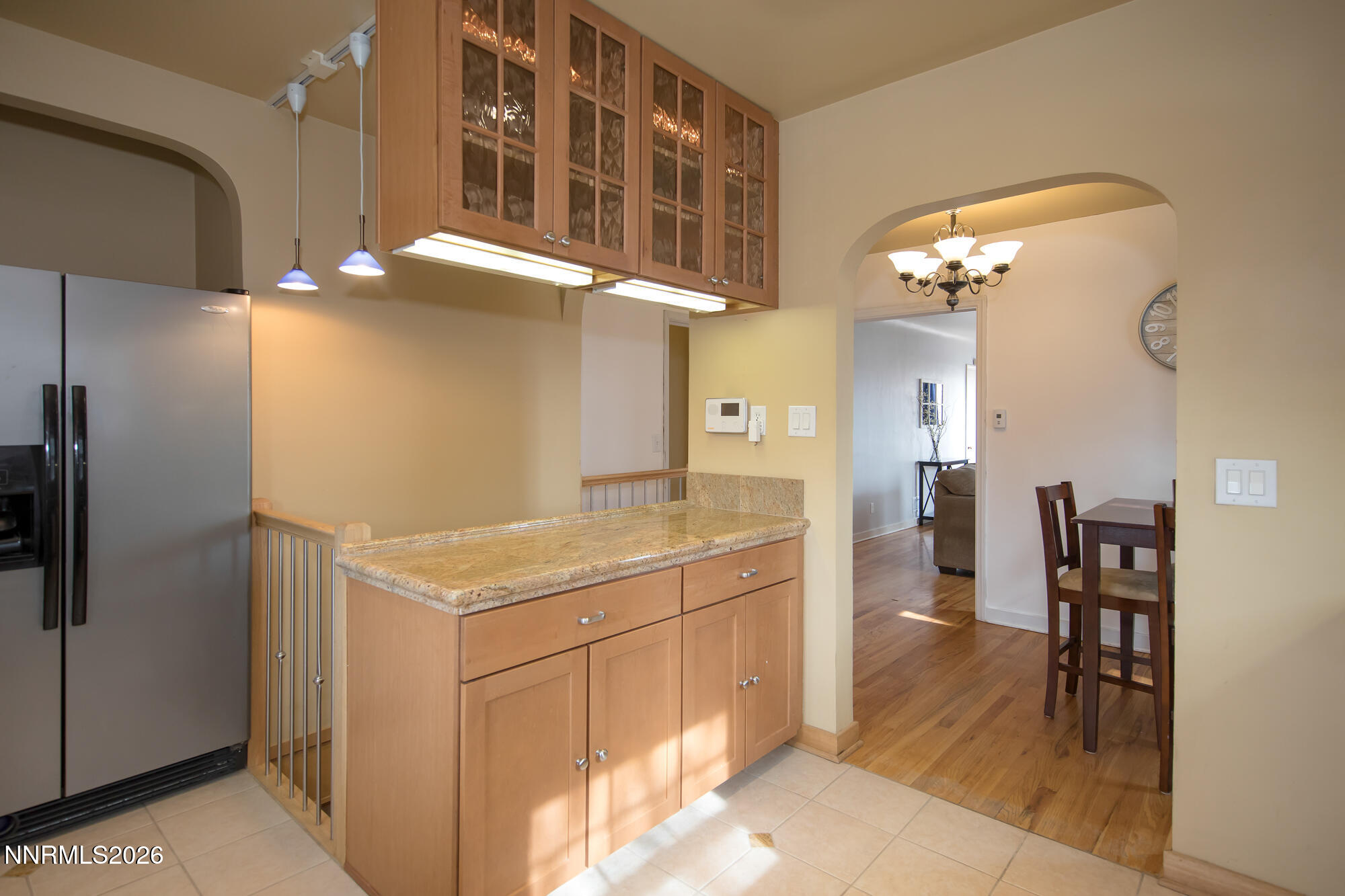 1025 Locust Street Reno, NV 89502 - Photo 7 of 28 a kitchen with cabinets and chairs