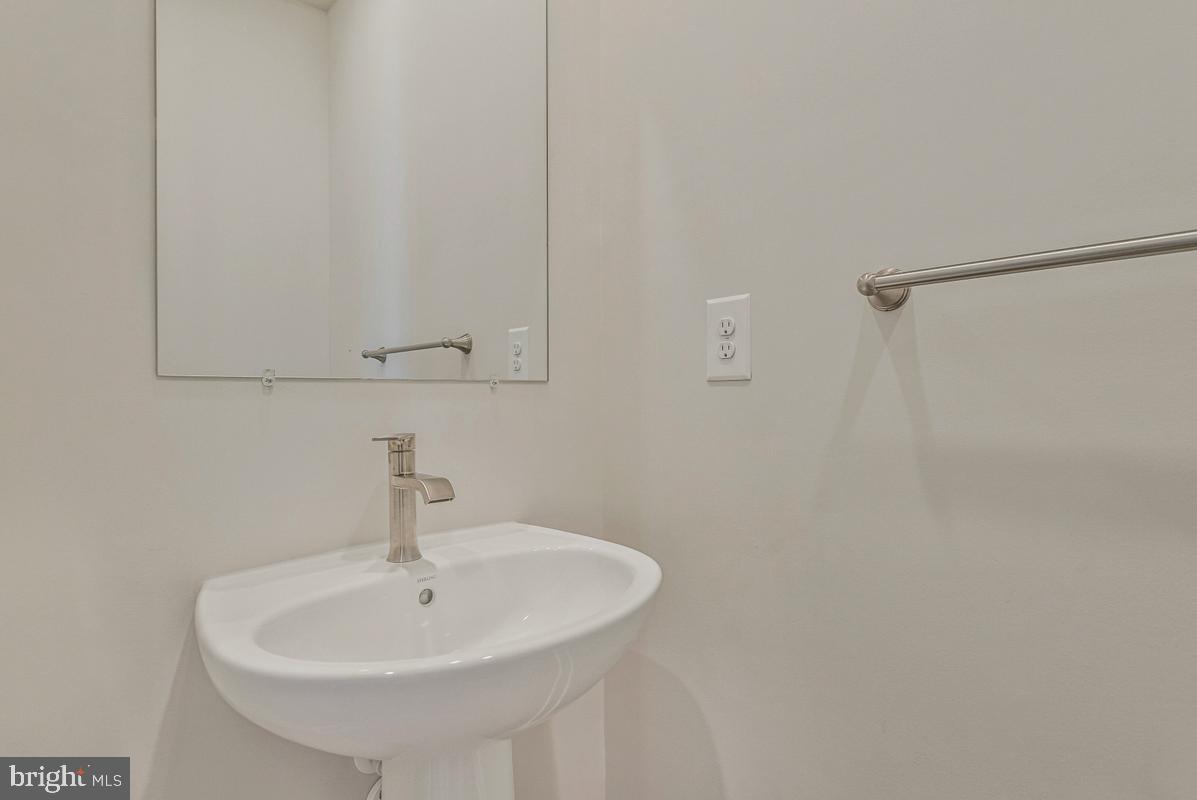 23606 Crosswinds Way California, MD 20619 - Photo 15 of 40 Half bath on main floor