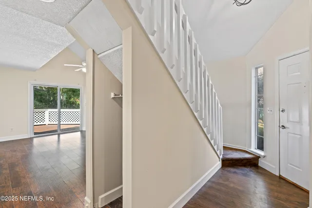 a bathroom with a sink toilet and a mirror