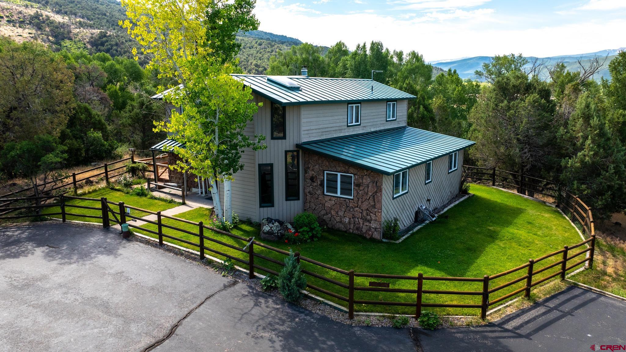 301 Tree Farm Drive Basalt, CO 81621 - Photo 6 of 35 an aerial view of a house with a big yard