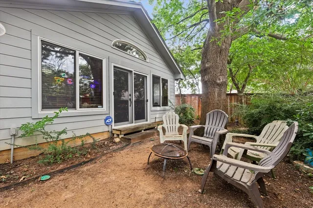 a view of house with outdoor seating space